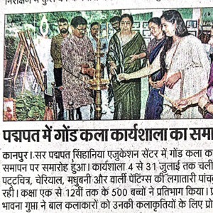 Group of men and women lighting a brass lamp during a workshop inauguration in a community setting.