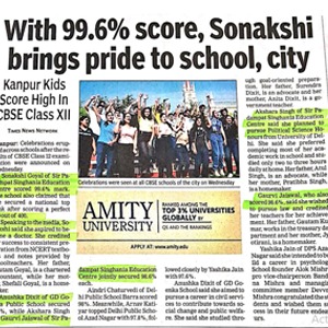Newspaper front page reporting Sonakshi's 99.6% CBSE Class XII score and city celebrations, with a group photo and Amity University ad.