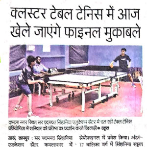 Hindi newspaper clipping about table tennis finals today; image shows a table-tennis match with two players, a referee, and a pink floor in the background